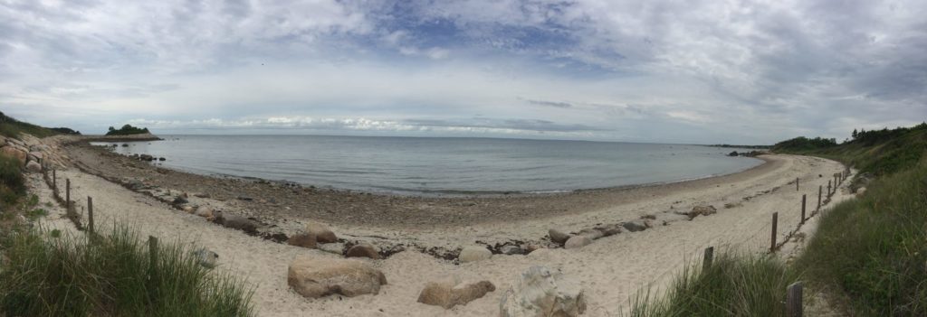 Panoramic view of The Knob beach in Falmouth on an overcast day