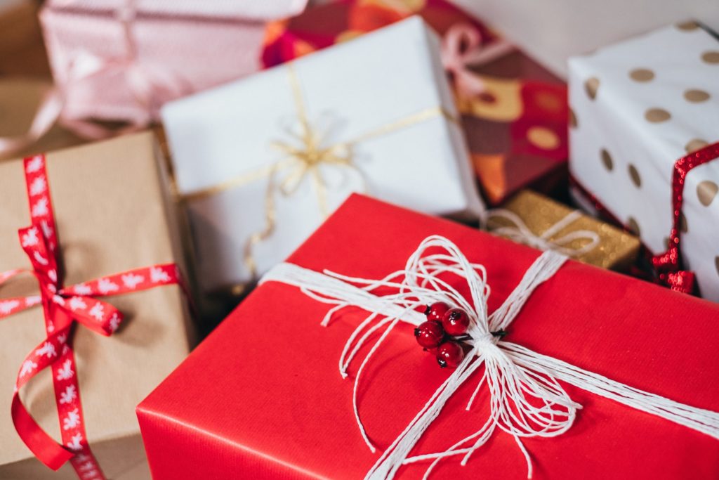 Wrapped holiday gifts in a pile