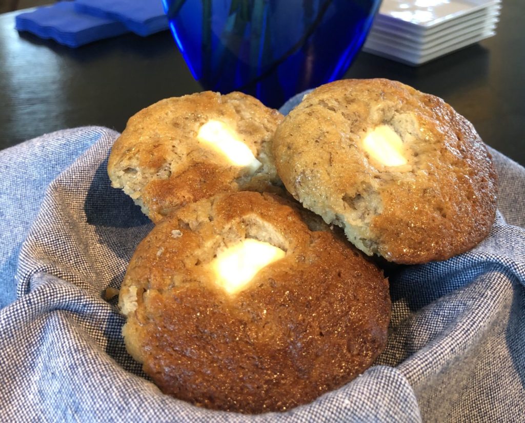Banana cream cheese muffins in a basket