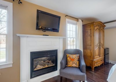 Beach Blossom Fireplace | Brewster By the Sea Cape Cod B&B | Brewster, MA