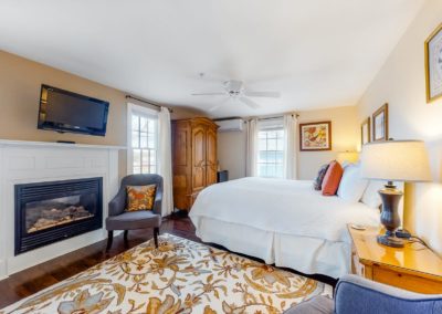 Beach Blossom Fireplace Bed | Brewster By the Sea Cape Cod B&B | Brewster, MA